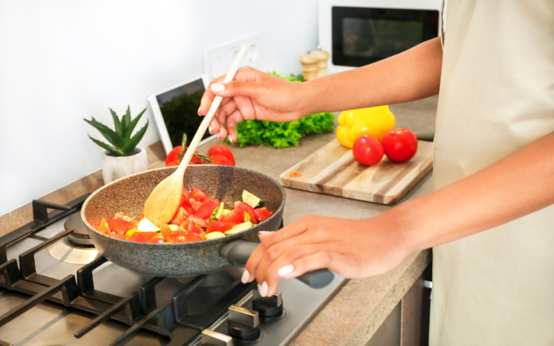 A colorful salad bowl with fresh vegetables and natural sunlight streaming in, representing mindful eating in The Holistic Guide to Wellness.